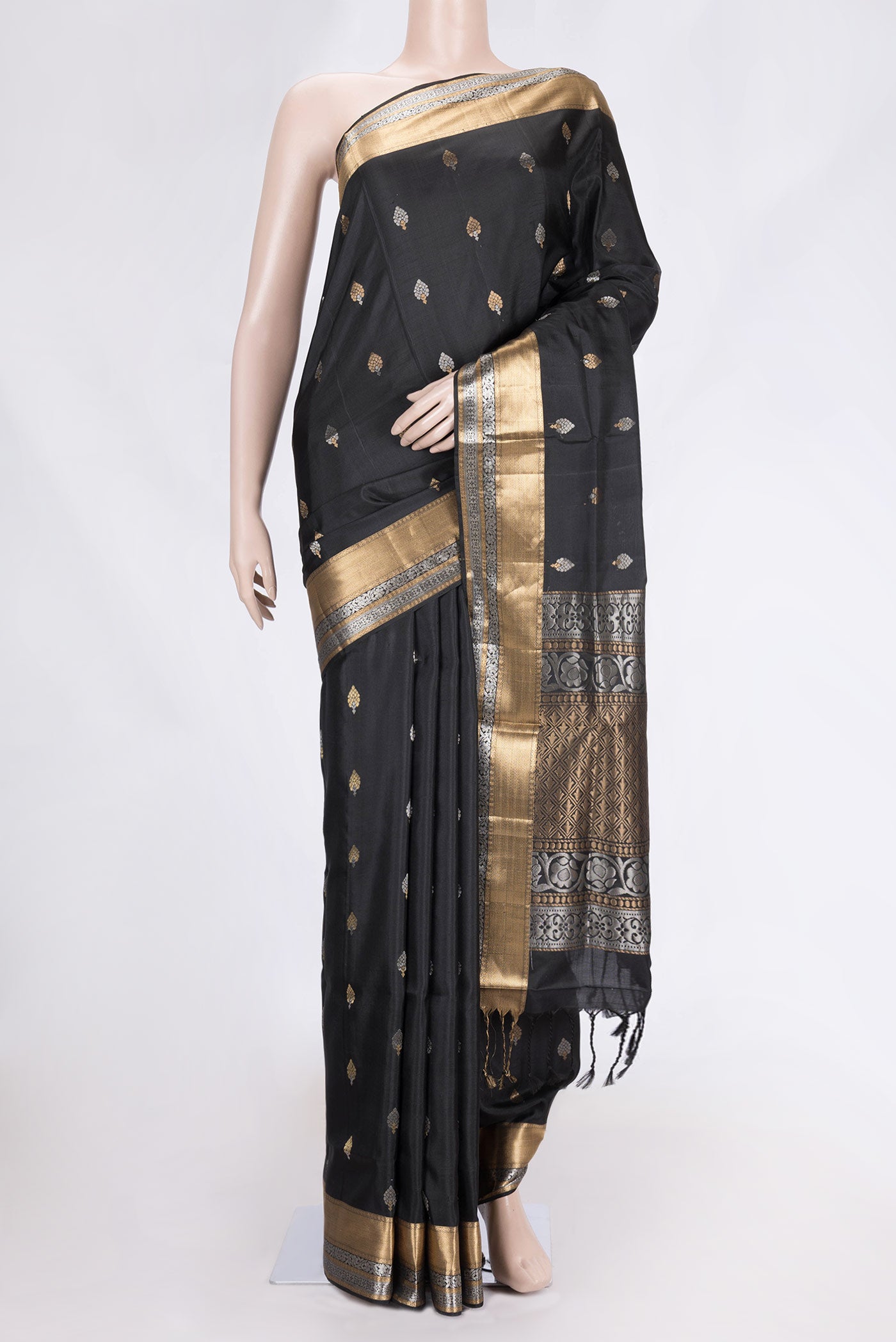 Black Dual Tone Soft Silk Saree with Zari Butta on the body and Zari Border.  displayed on a mannequin