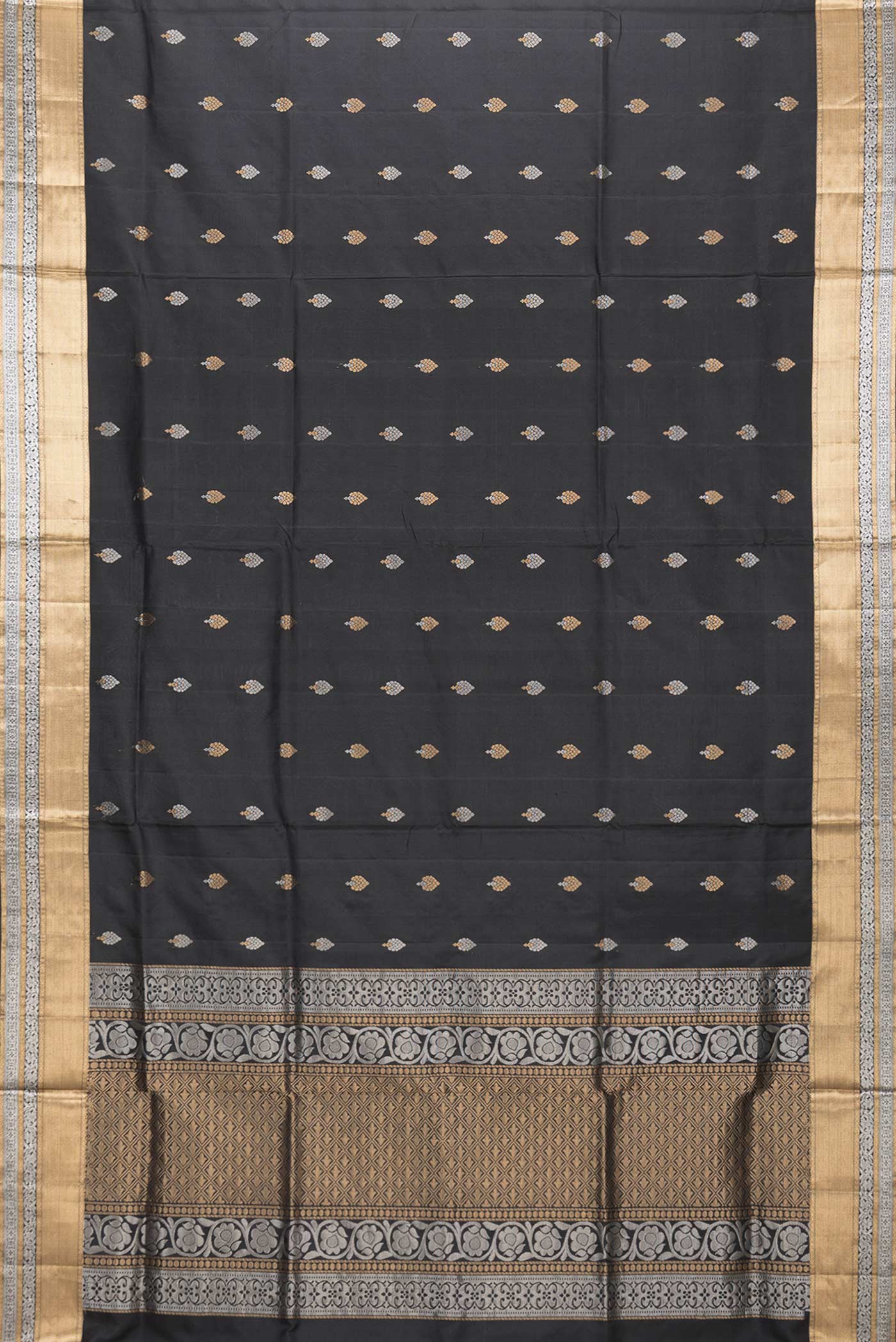 Flat view of Black Dual Tone Soft Silk Saree with Zari Butta on the body and Zari Border. 