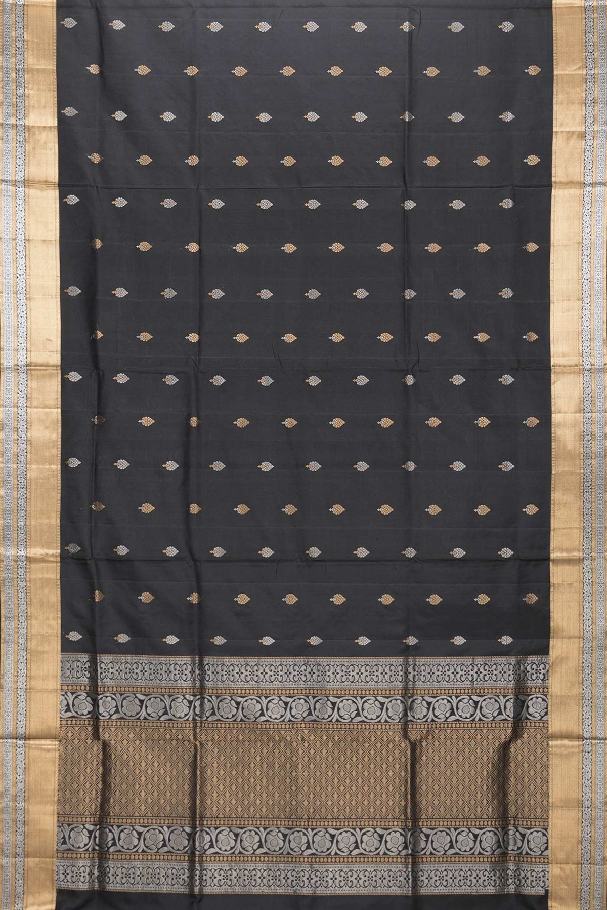 Flat view of Black Dual Tone Soft Silk Saree with Zari Butta on the body and Zari Border. 