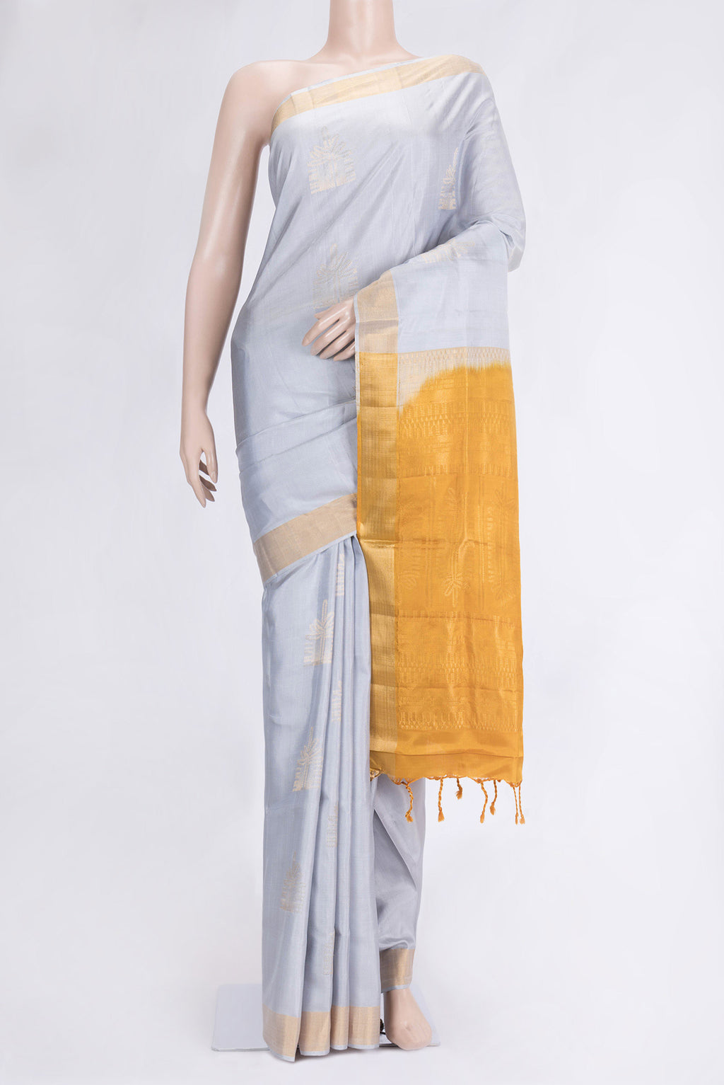 Grey Dual Tone Soft Silk Saree with Zari Butta on the body and Zari Border.  displayed on a mannequin