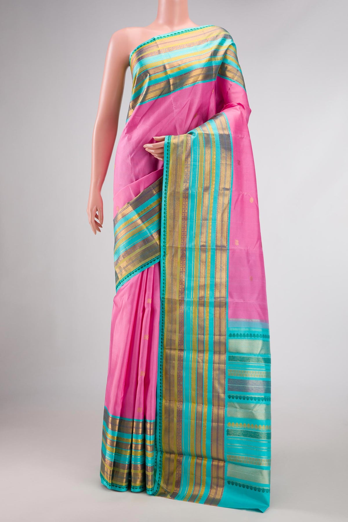 Pink Dual Tone Kanjivaram Silk Saree with Zari Butta on the body and Zari Border.  displayed on a mannequin