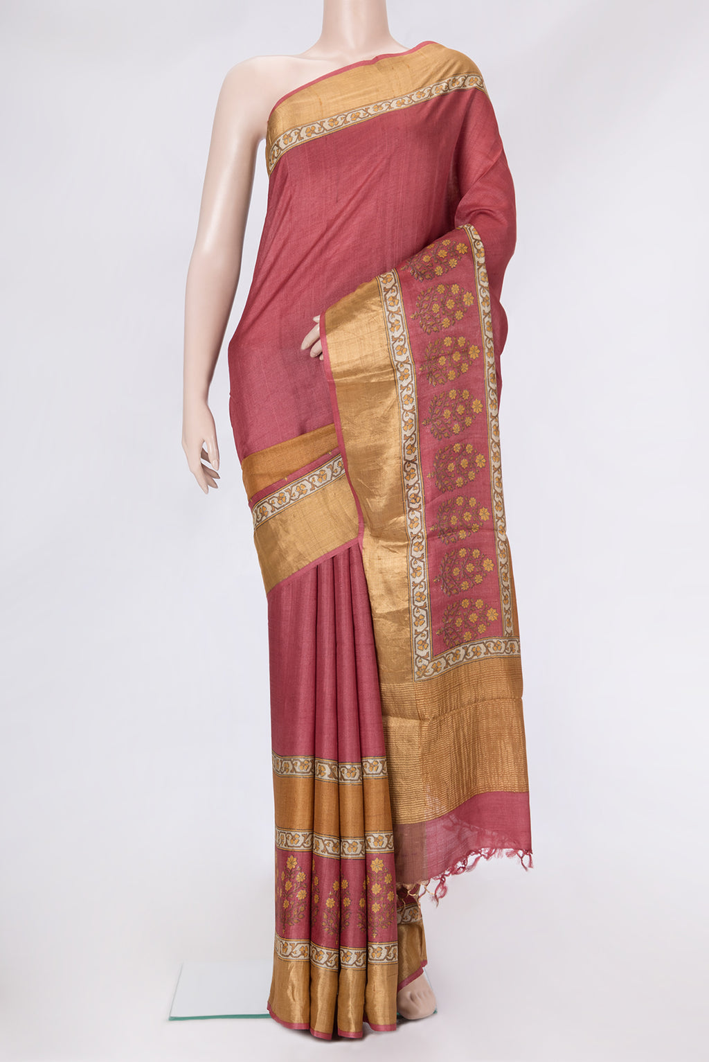 Maroon Dual Tone Tussar Silk Saree with Printed design on the body and Zari Border.  displayed on a mannequin