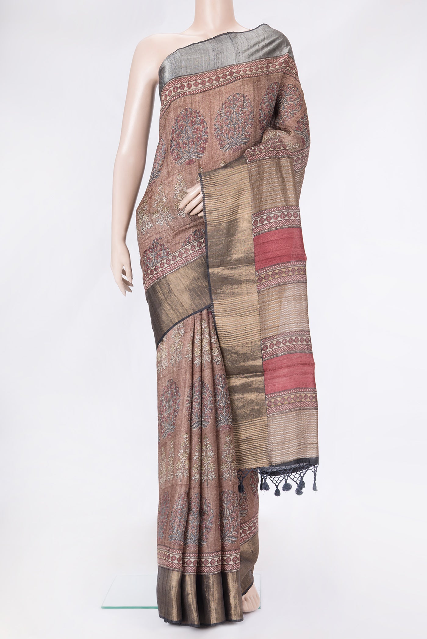 Brown Dual Tone Tussar Silk Saree with Printed design on the body and Zari Border.  displayed on a mannequin