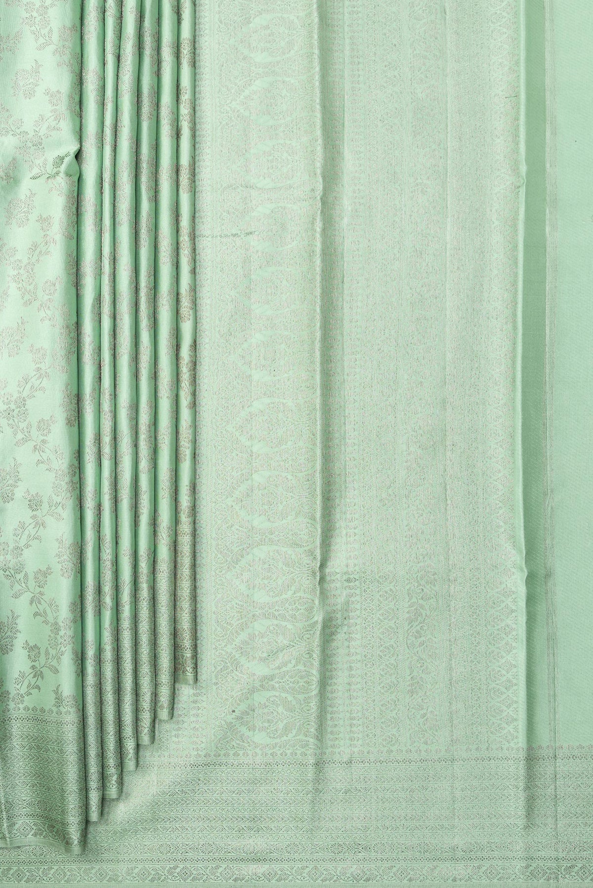 Pleats and pallu of Pure Silk Pista Green Kanjivaram Saree with Zari Brocade on the body and Fancy Border. 
