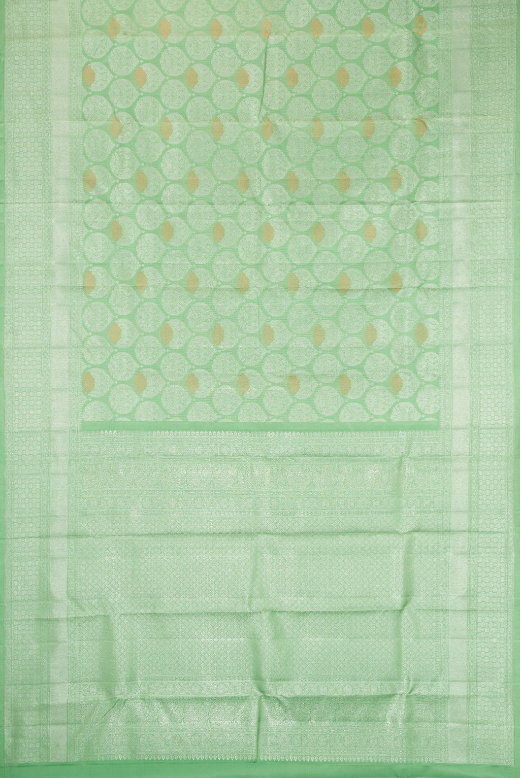Flat view of Light Green Dual Tone Kanchipuram Silk Saree with Zari Brocade on the body and Zari Border. 