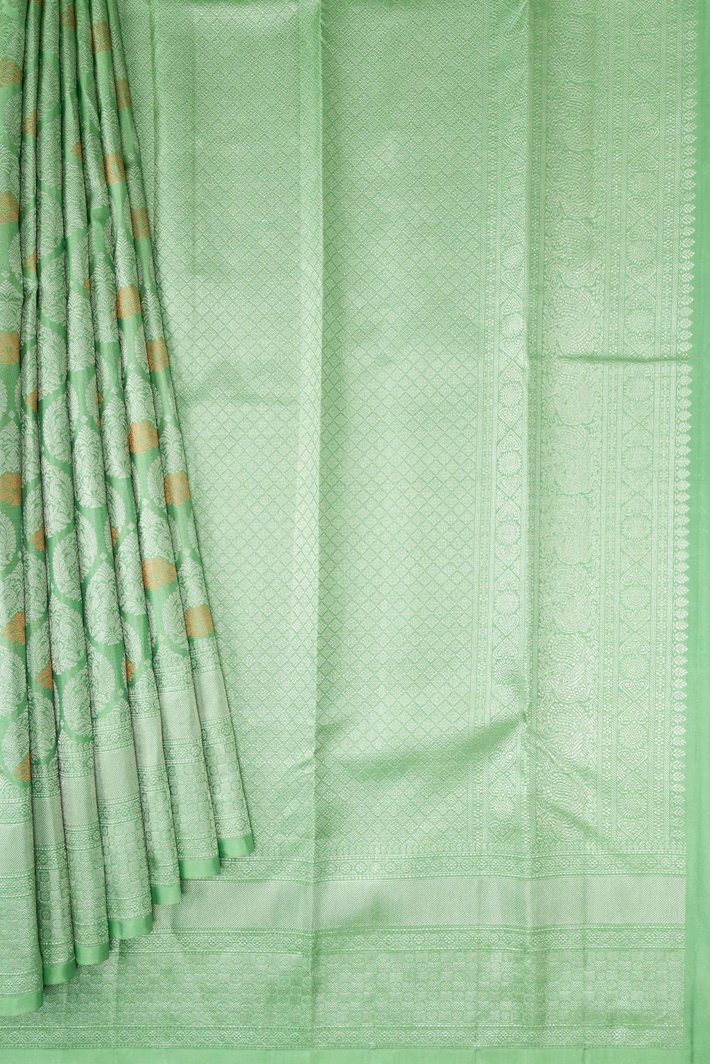 Pleats and pallu of Light Green Dual Tone Kanchipuram Silk Saree with Zari Brocade on the body and Zari Border. 