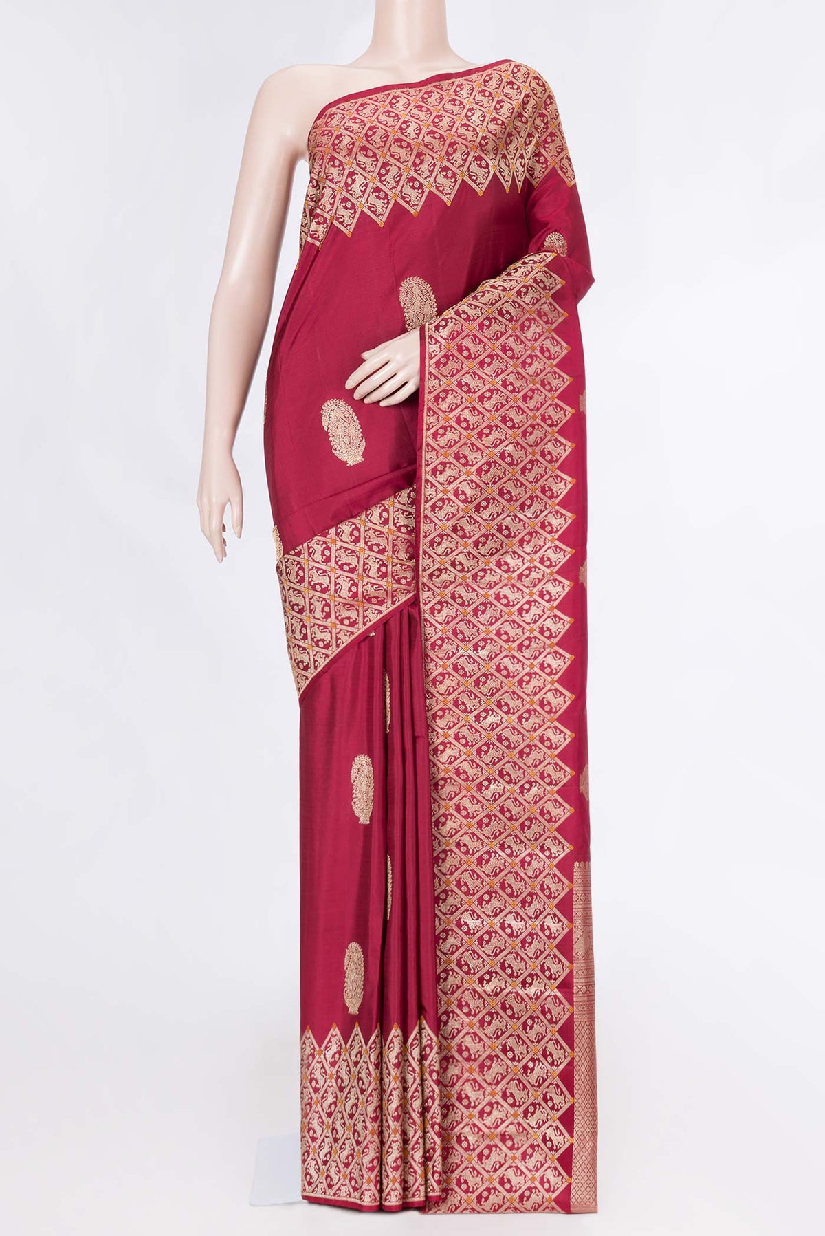 Maroon Dual Tone Kanchipuram Saree with Zari Butta on the body and Fancy Border displayed on a mannequin