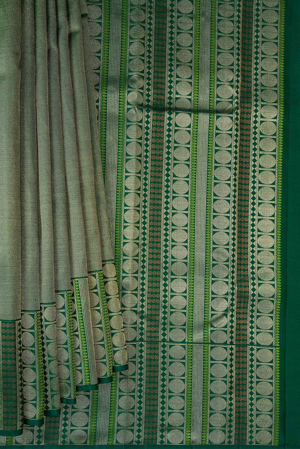 Pleats and pallu of Green Dual Tone Kanchipuram Silk Saree with Zari Brocade on the body and Fancy Border. 