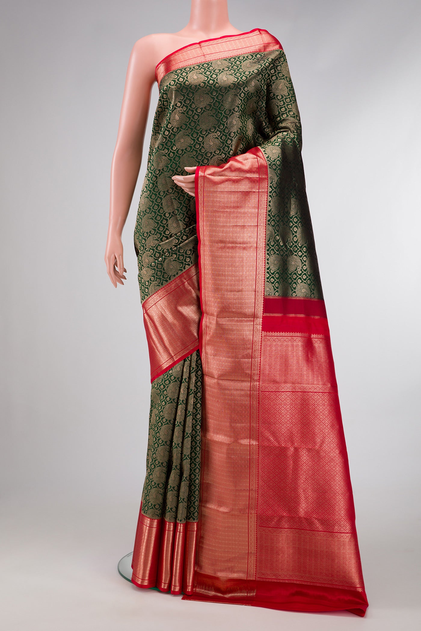 Bottle Green Dual Tone Kanchipuram Silk Saree with Zari Brocade on the body and Zari Border.  displayed on a mannequin