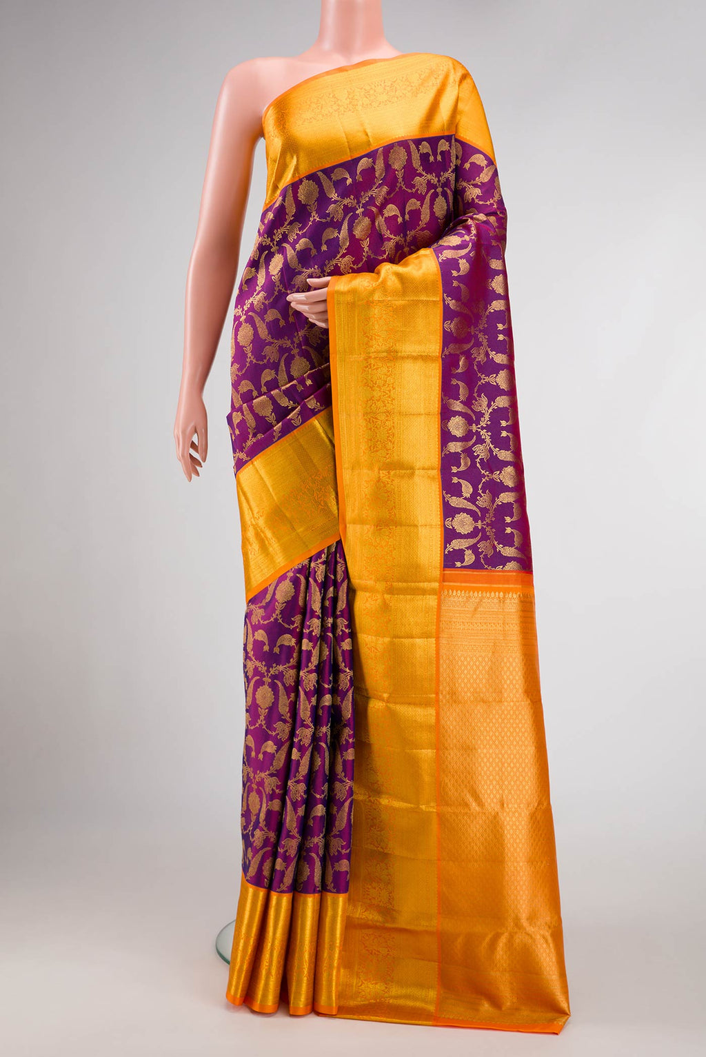 Purple Dual Tone Kanchipuram Silk Saree with Zari Brocade on the body and Zari Border.  displayed on a mannequin