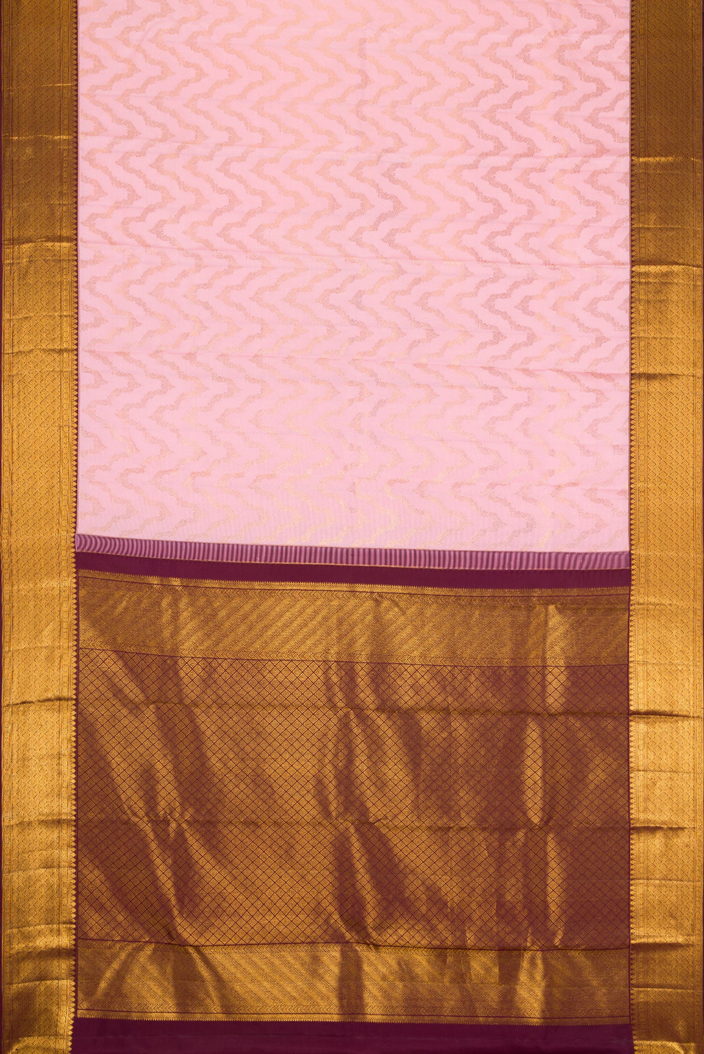 Flat view of Pink Dual Tone Kanchipuram Silk Saree with Zari Brocade on the body and Zari Border. 