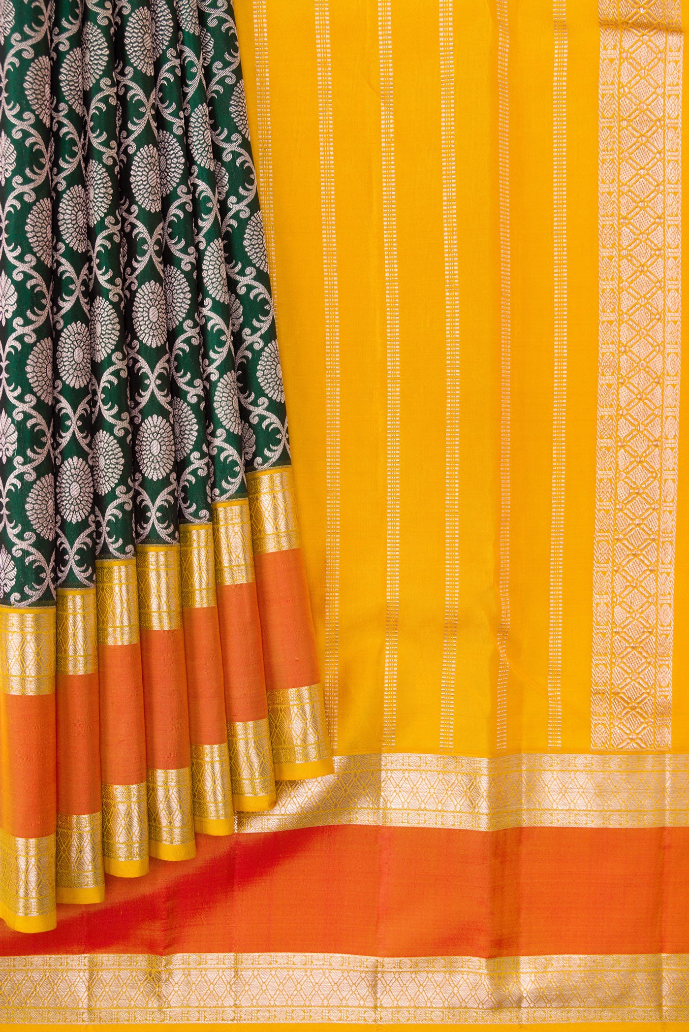 Pleats and pallu of Bottle Green Dual Tone Kanjivaram Silk Saree with Zari Brocade on the body and Zari Border. 