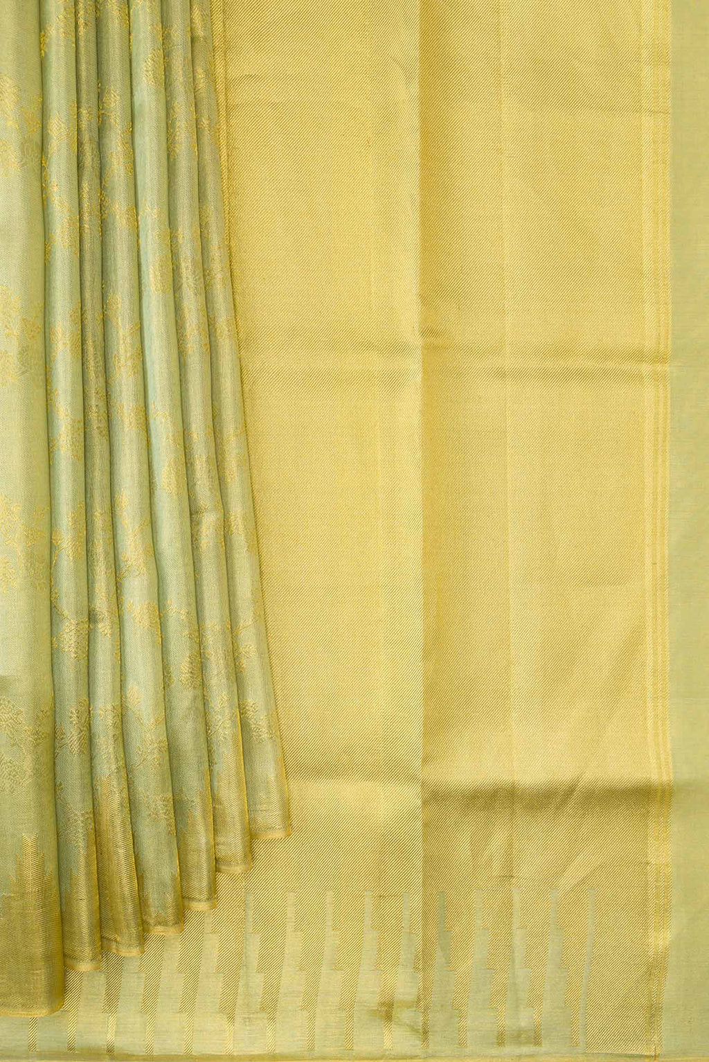 Pleats and pallu of Light Green Dual Tone Kanchipuram Tissue Silk Saree with Zari Brocade on the body and Zari Border. 