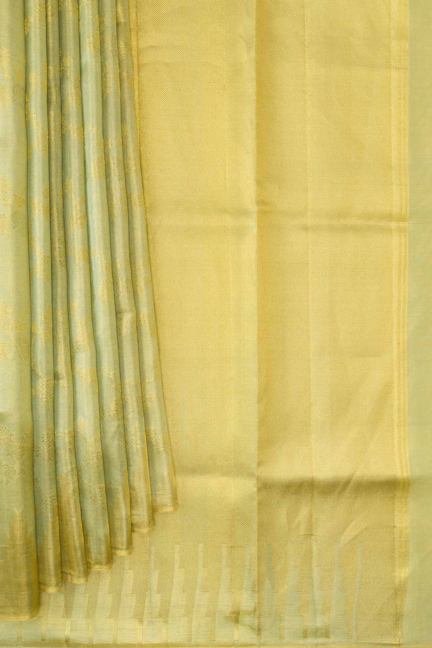 Pleats and pallu of Light Green Dual Tone Kanchipuram Tissue Silk Saree with Zari Brocade on the body and Zari Border. 