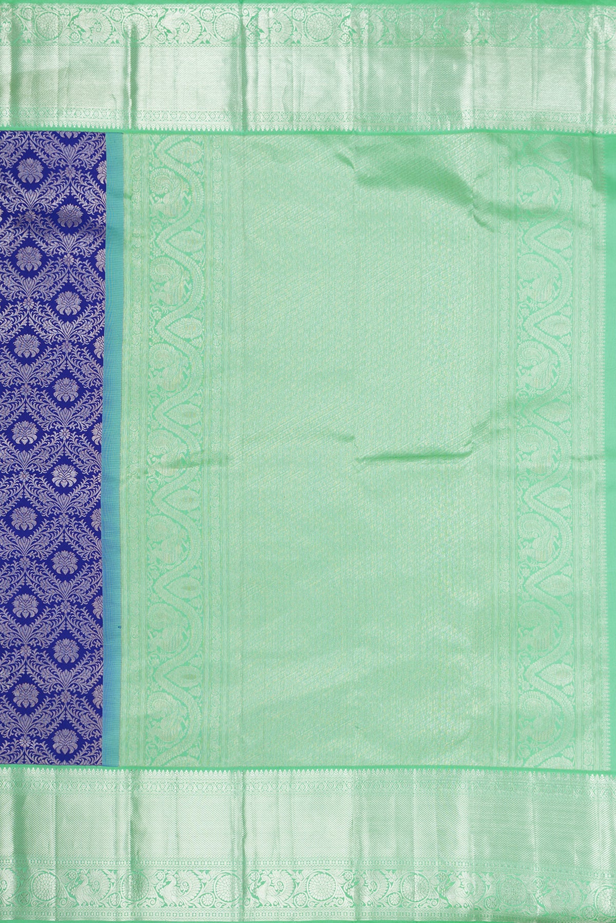 Close up image of the pallu of Royal Blue Dual Tone Kanjivaram Silk Saree with Zari Brocade on the body and Zari Border. 