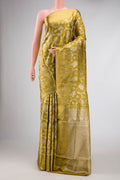 Gold Dual Tone Kanjivaram Tissue Silk Saree with Zari Brocade on the body and Zari Border.  displayed on a mannequin
