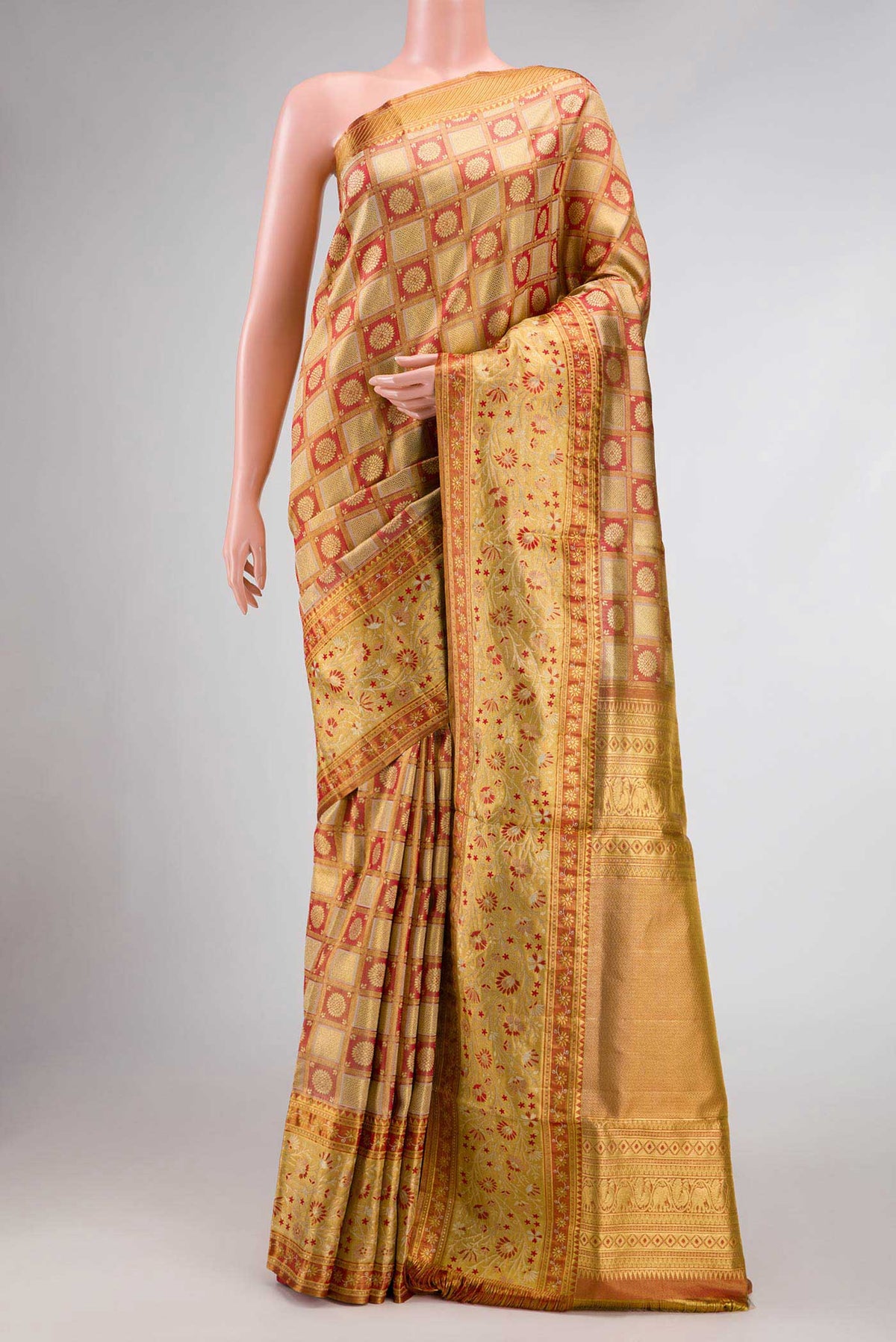 Red Dual Tone Kanchipuram Tissue Silk Saree with Zari Brocade on the body and Zari Border.  displayed on a mannequin