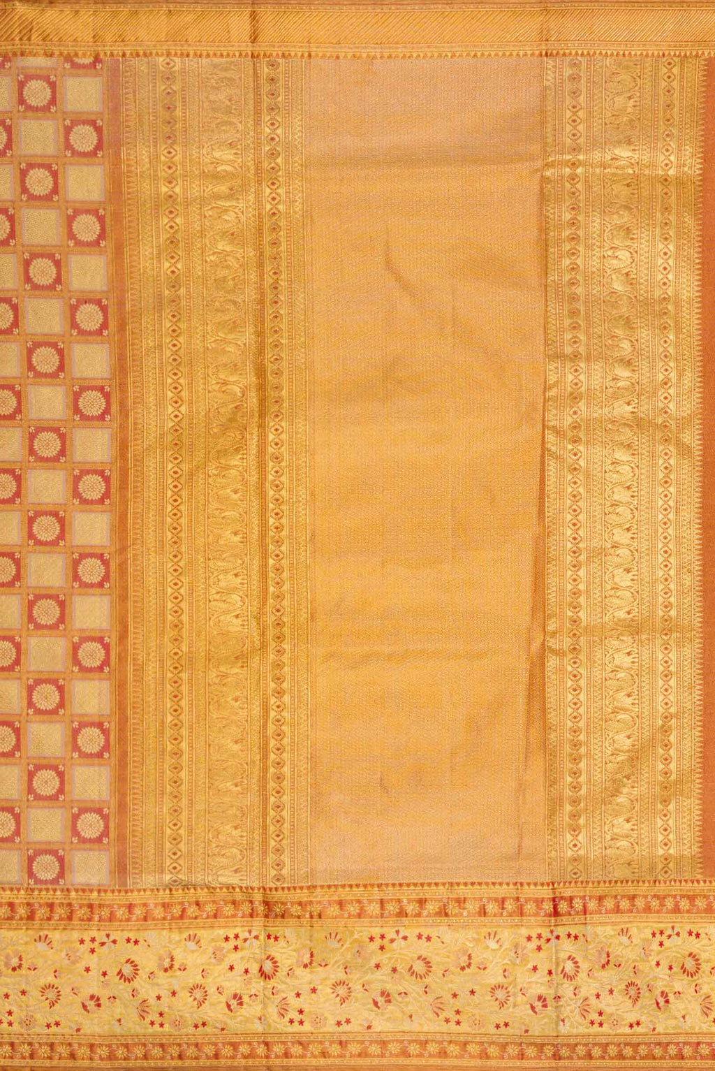 Close up image of the pallu of Red Dual Tone Kanchipuram Tissue Silk Saree with Zari Brocade on the body and Zari Border. 