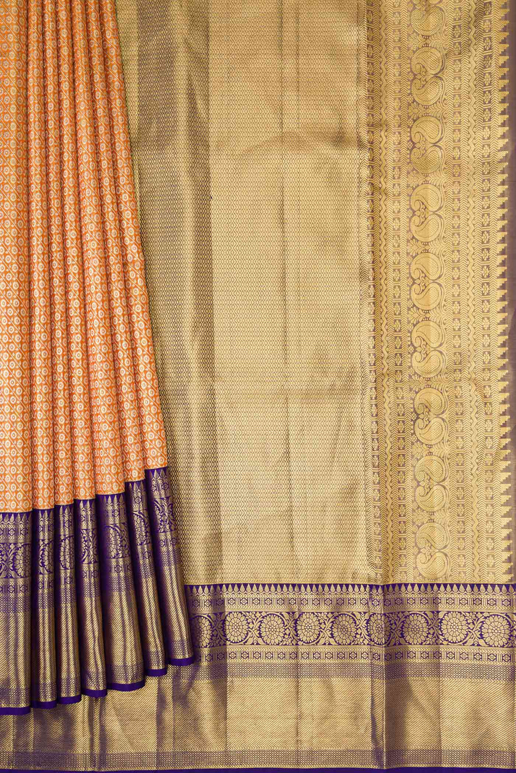 Pleats and pallu of Golden Peach Dual Tone Kanchipuram Tissue Silk Saree with Zari Brocade on the body and Zari Border. 