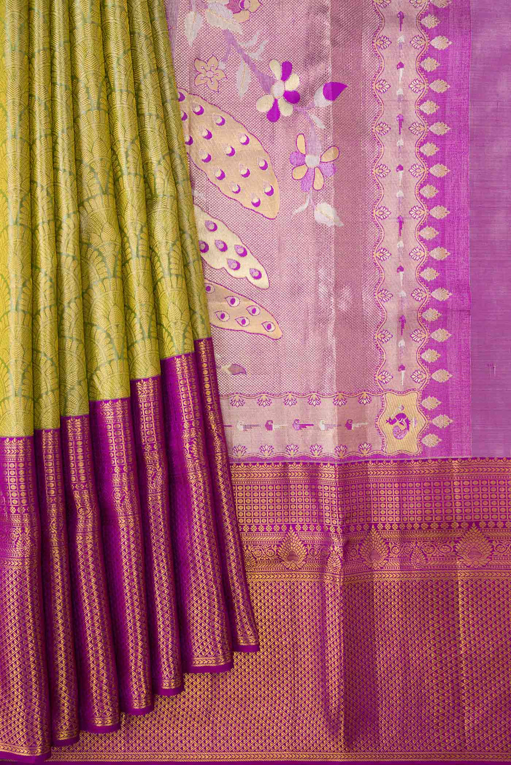 Pleats and pallu of Green Dual Tone Kanchipuram Tissue Silk Saree with Zari Brocade on the body and Zari Border