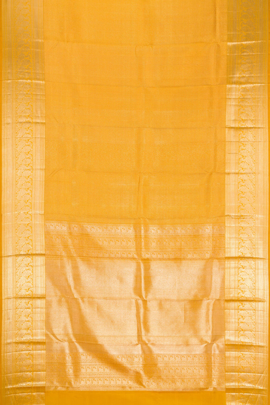Flat view of Mustard Kanchipuram Silk Saree with Zari Brocade on the body and Zari Border. 