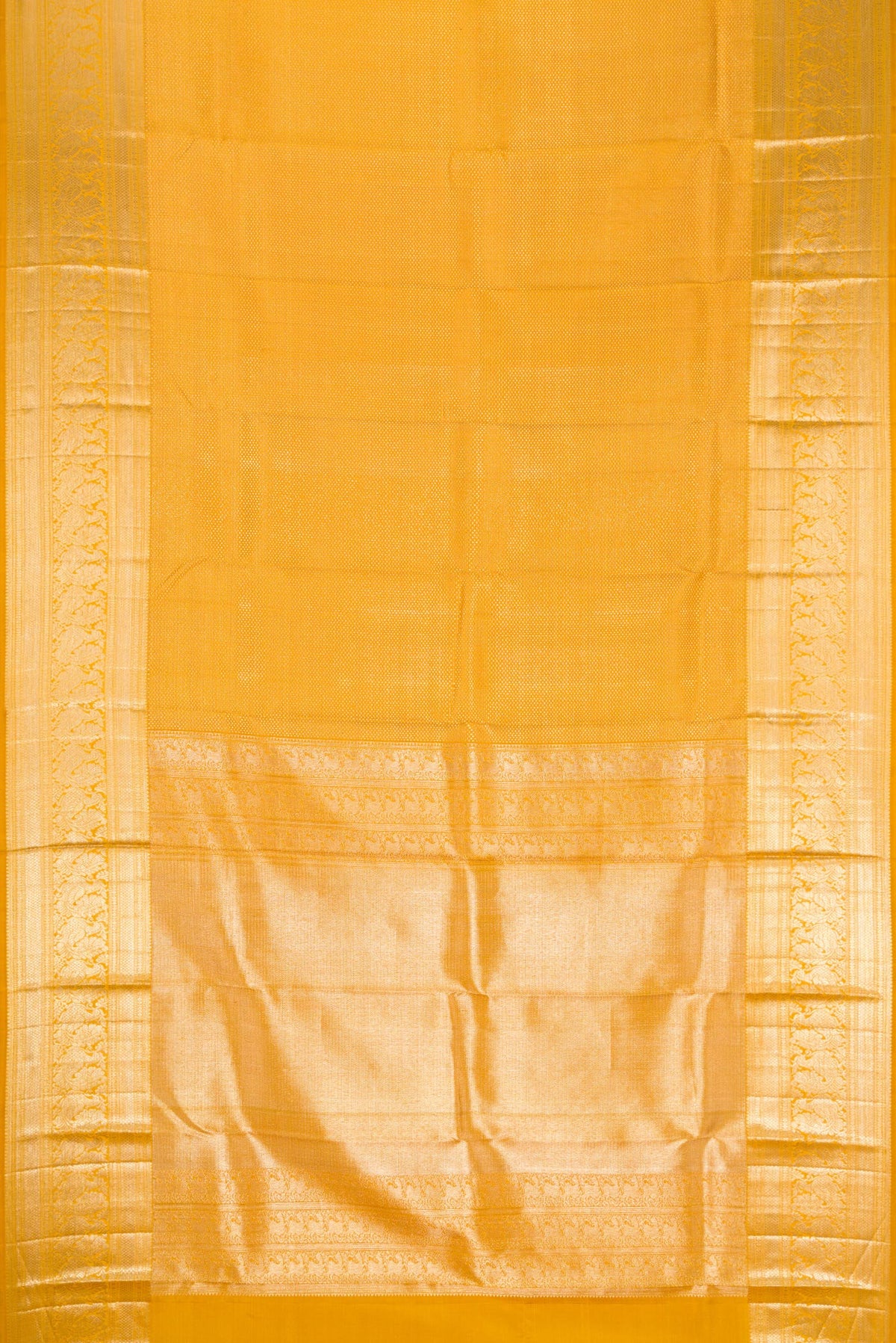 Flat view of Mustard Kanchipuram Silk Saree with Zari Brocade on the body and Zari Border. 