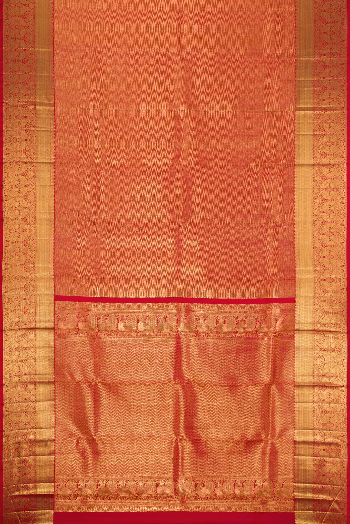 Flat view of Red Dual Tone Kanchipuram Silk Saree with Zari Brocade on the body and Zari Border. 