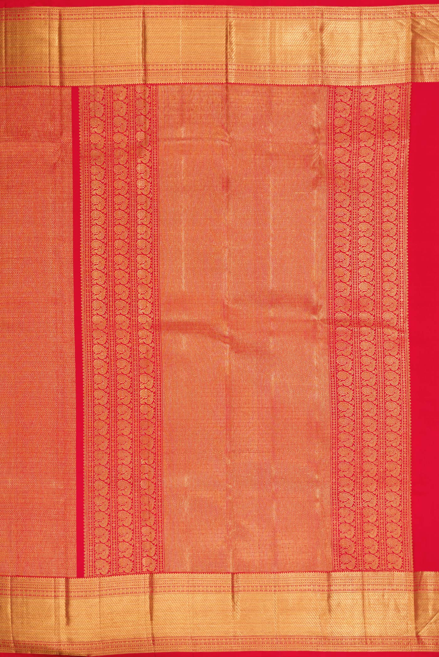 Close up image of the pallu of Red Kanchipuram Silk Saree with Zari Brocade on the body and Zari Border. 