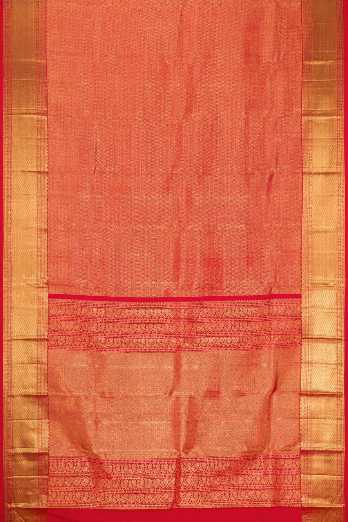 Flat view of Red Kanchipuram Silk Saree with Zari Brocade on the body and Zari Border. 