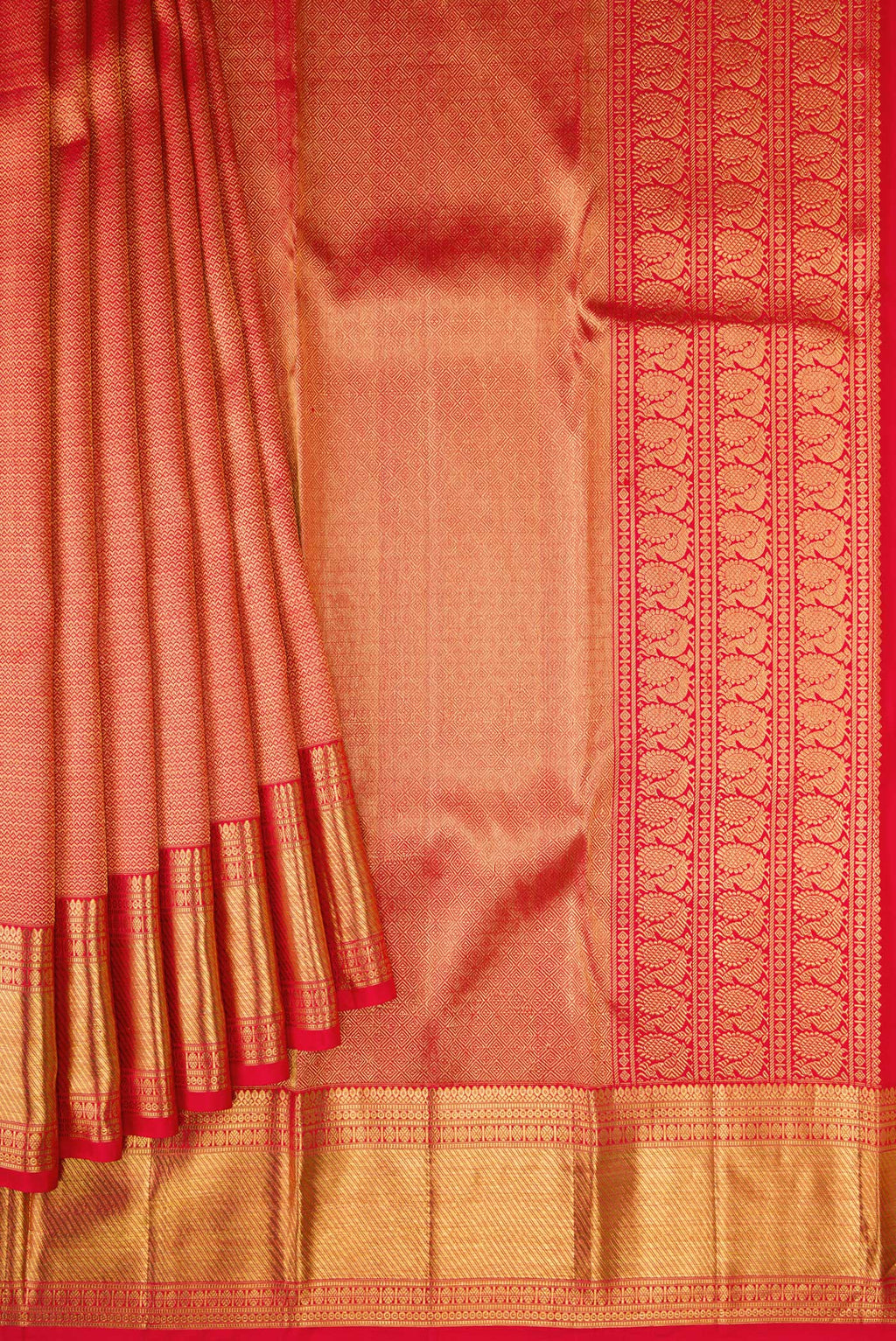 Pleats and pallu of Red Kanchipuram Silk Saree with Zari Brocade on the body and Zari Border. 