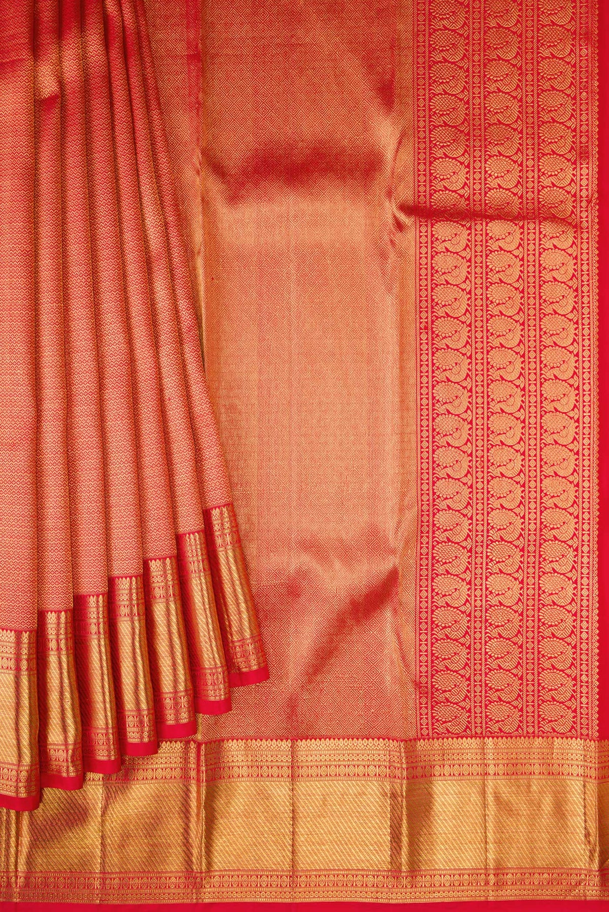 Pleats and pallu of Red Kanchipuram Silk Saree with Zari Brocade on the body and Zari Border. 