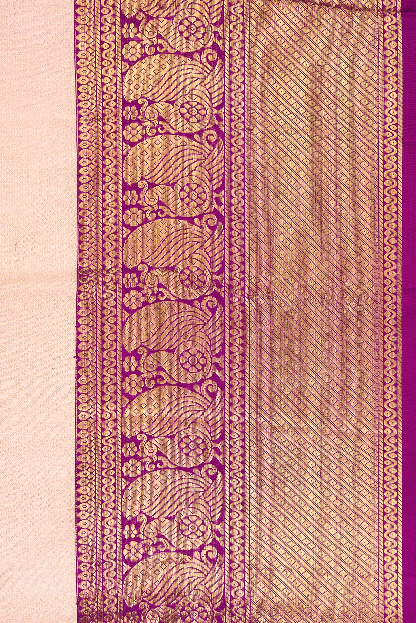 Border image of Golden Peach Dual Tone Kanchipuram Silk Saree with Zari Brocade on the body and Zari Border. 