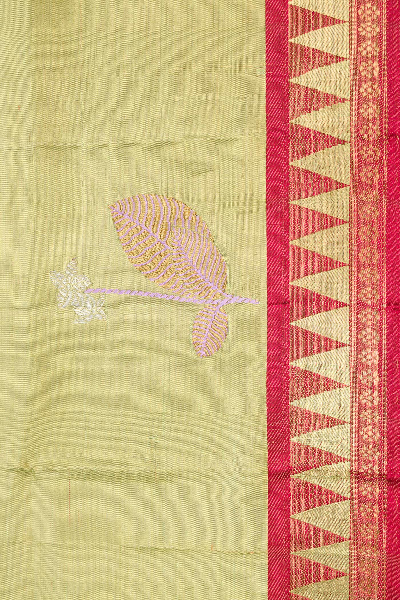 Border image of Pista Green Dual Tone Kanjivaram Tissue Silk Saree with Zari And Thread Butta on the body and Zari Border. 