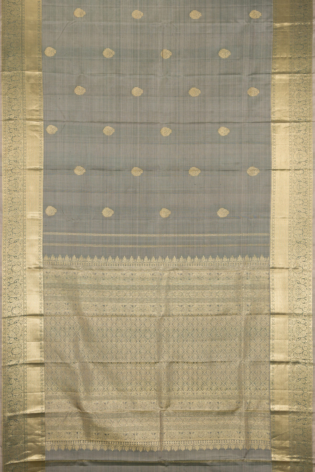 Flat view of Grey Kanchipuram Silk Saree with Zari Butta on the body and Zari Border. 