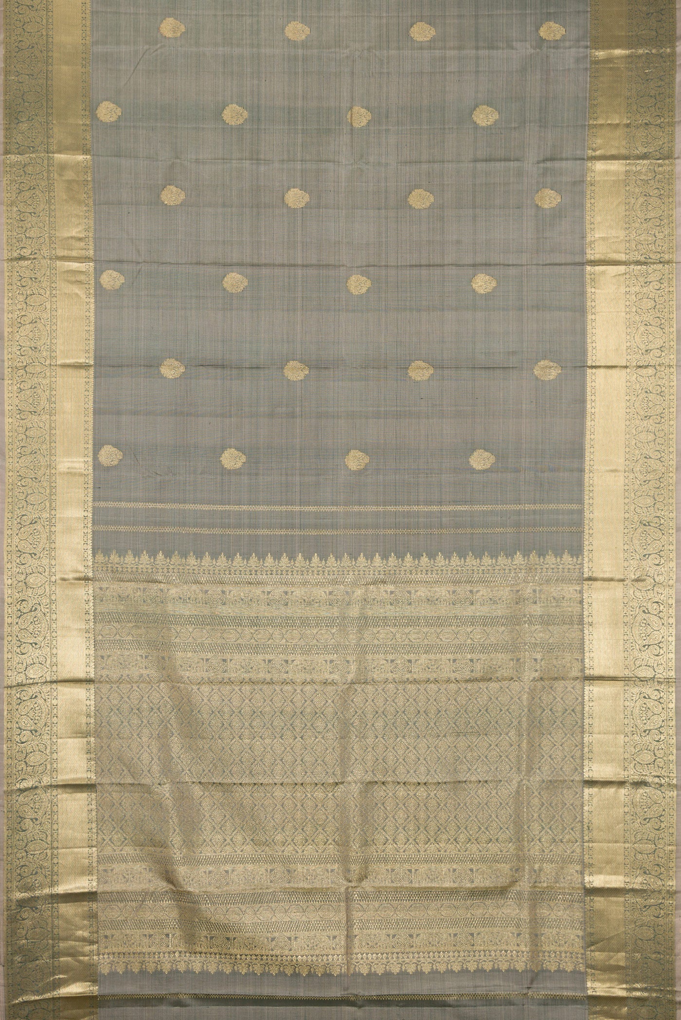 Flat view of Grey Kanchipuram Silk Saree with Zari Butta on the body and Zari Border. 