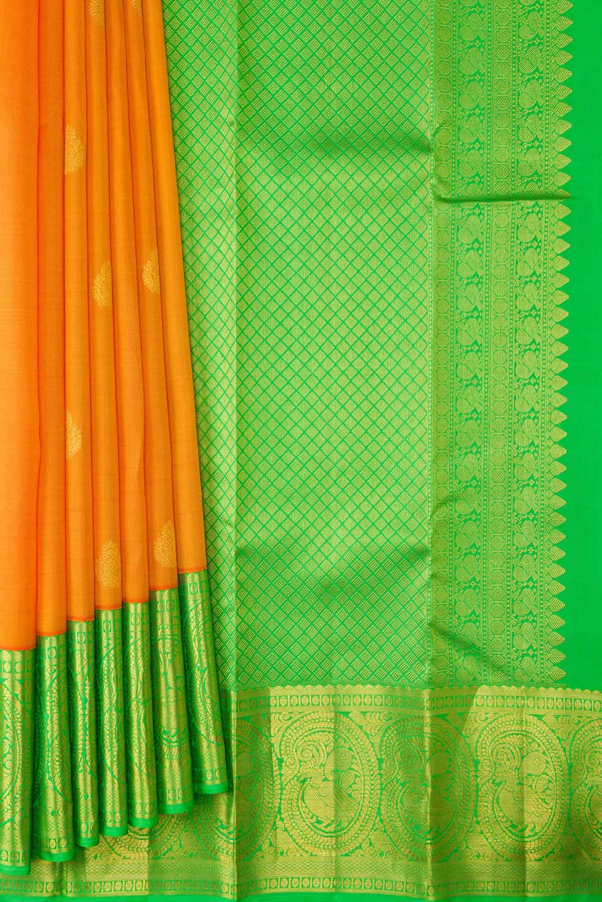 Pleats and pallu of Orange Dual Tone Kanchipuram Saree with Zari Butta on the body and Zari Border