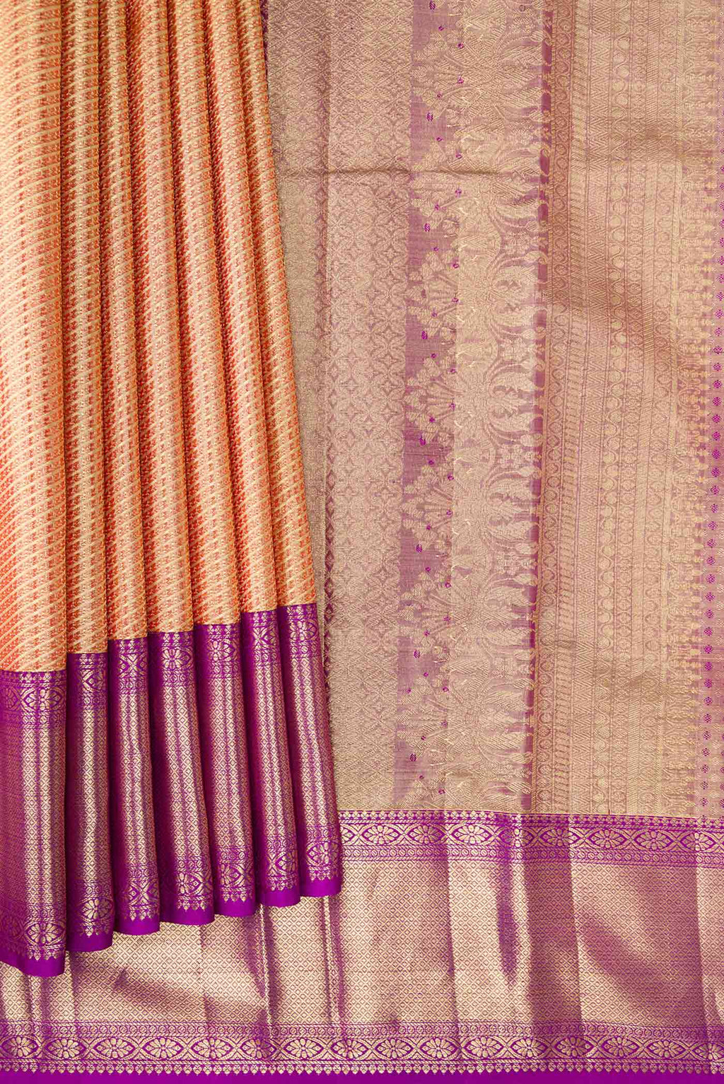 Pleats and pallu of Gold Dual Tone Kanjivaram Tissue Silk Saree with Zari Brocade on the body and Zari Border. 