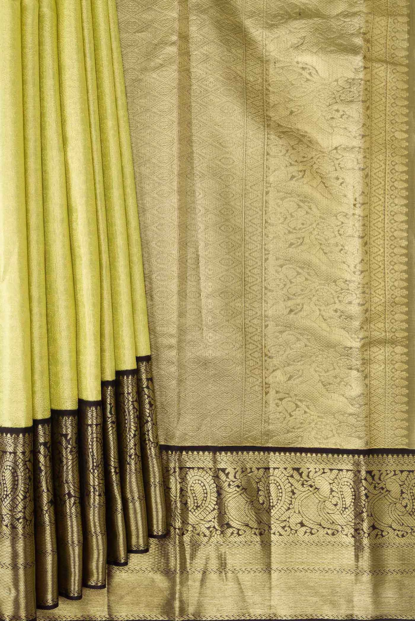 Pleats and pallu of Pista Green Dual Tone Kanjivaram Tissue Silk Saree with Zari Brocade on the body and Zari Border. 