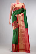 Green Dual Tone Kanjivaram Silk Saree with Zari Brocade on the body and Zari Border.  displayed on a mannequin