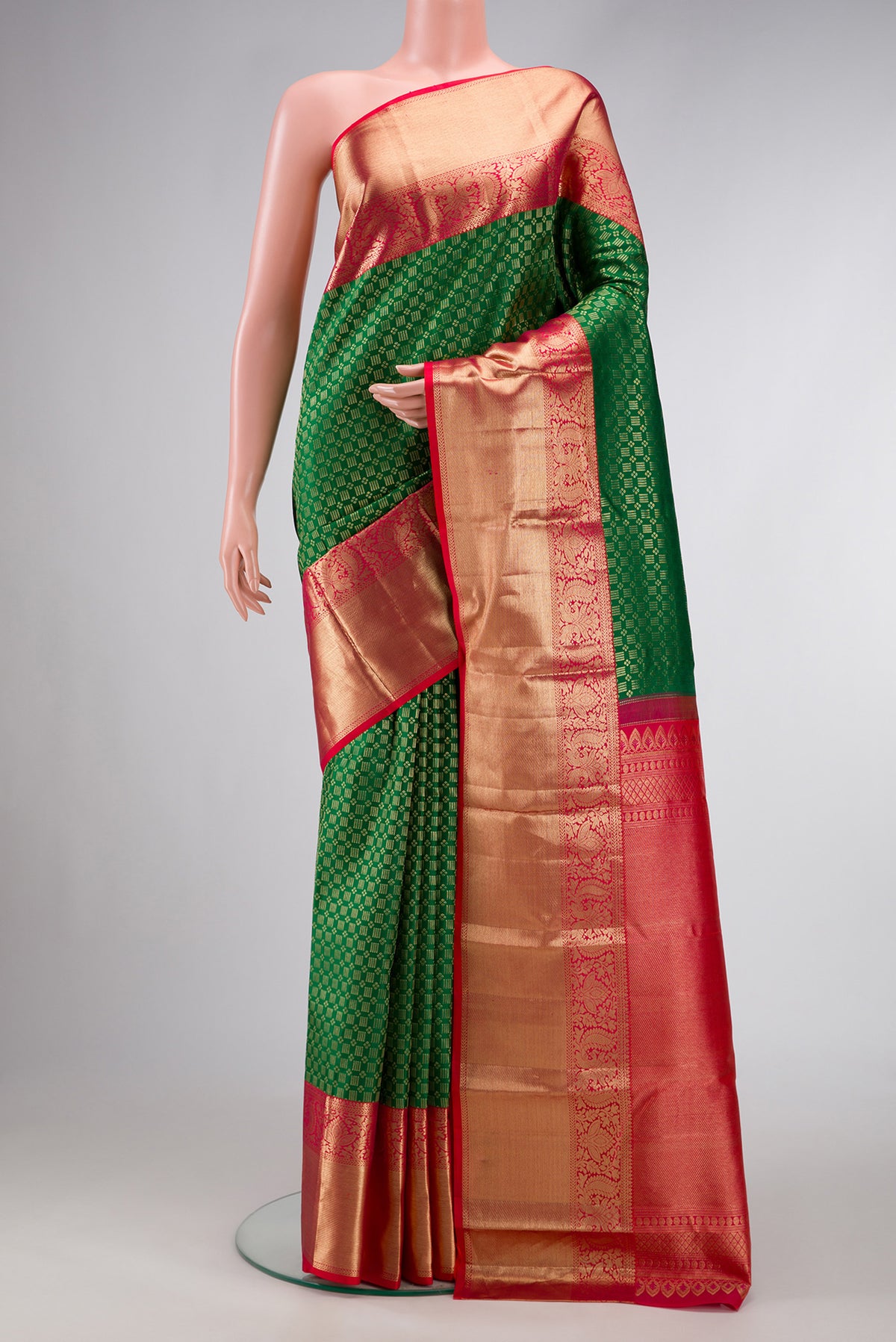 Green Dual Tone Kanjivaram Silk Saree with Zari Brocade on the body and Zari Border.  displayed on a mannequin