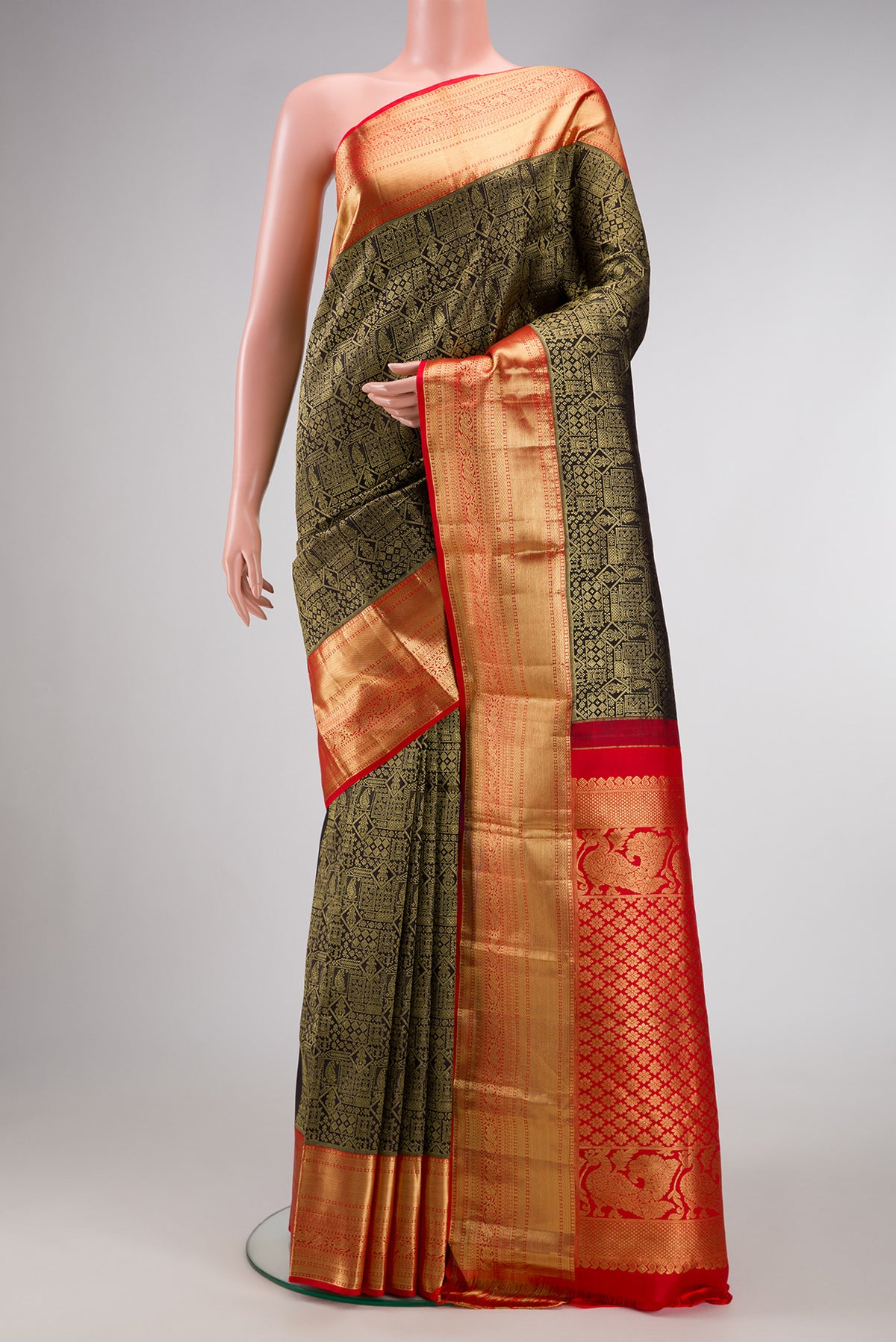 Black Dual Tone Kanjivaram Silk Saree with Zari Brocade on the body and Zari Border.  displayed on a mannequin