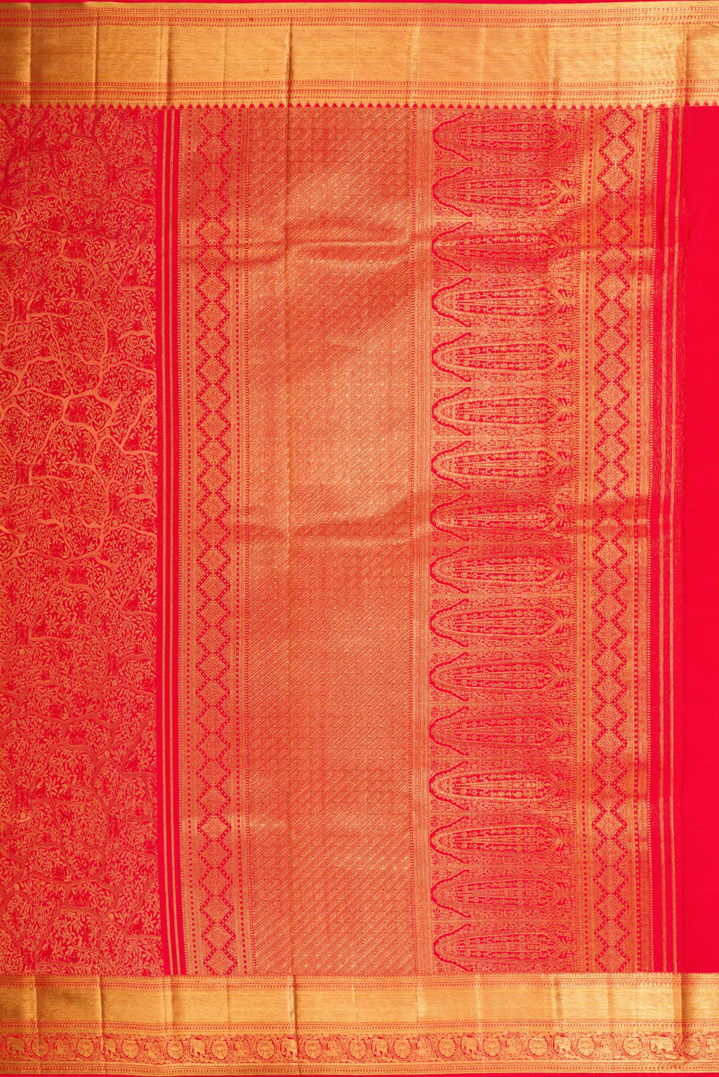Close up image of the pallu of Red Dual Tone Kanjivaram Silk Saree with Zari Brocade on the body and Zari Border. 