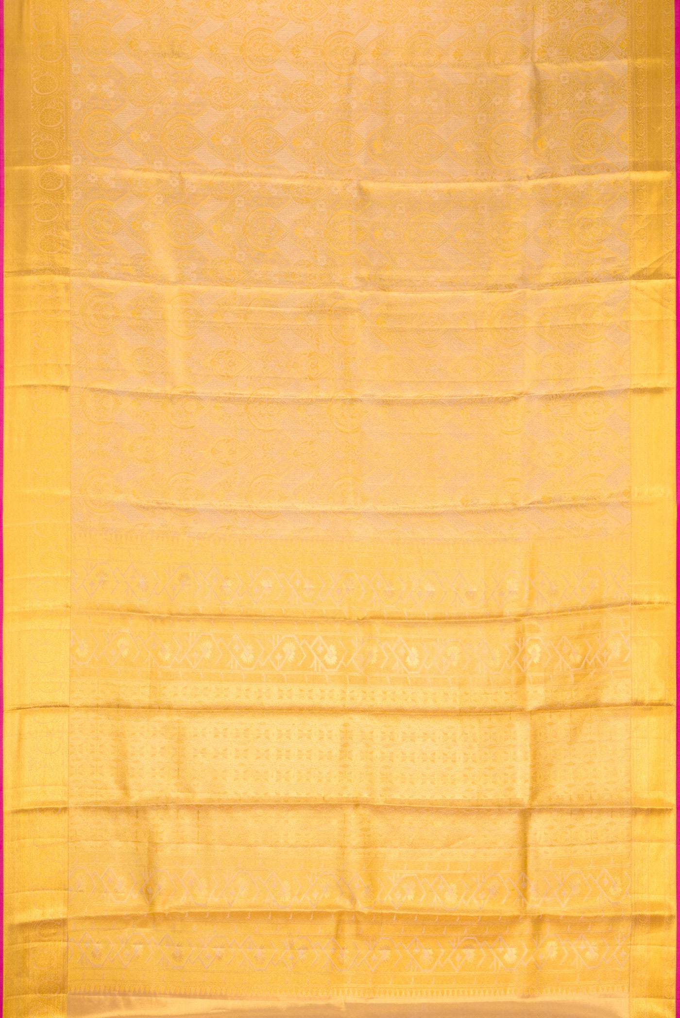 Flat view of Gold Dual Tone Kanchipuram Tissue Silk Saree with Zari Brocade on the body and Zari Border. 