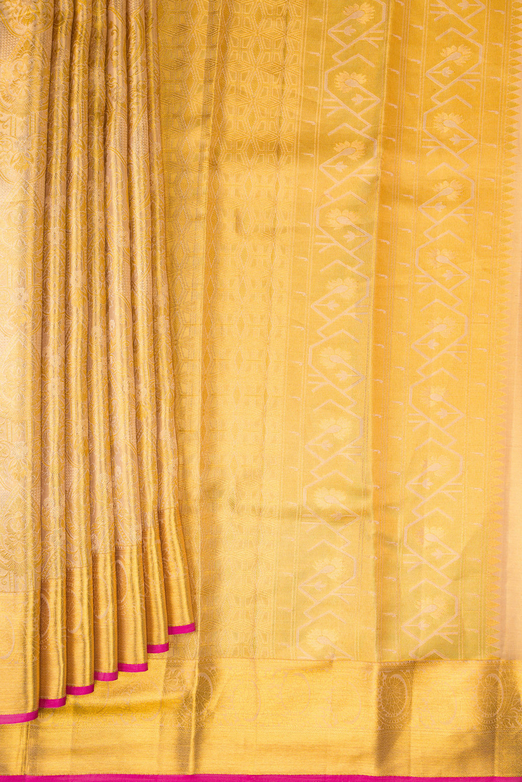 Pleats and pallu of Gold Dual Tone Kanchipuram Tissue Silk Saree with Zari Brocade on the body and Zari Border. 