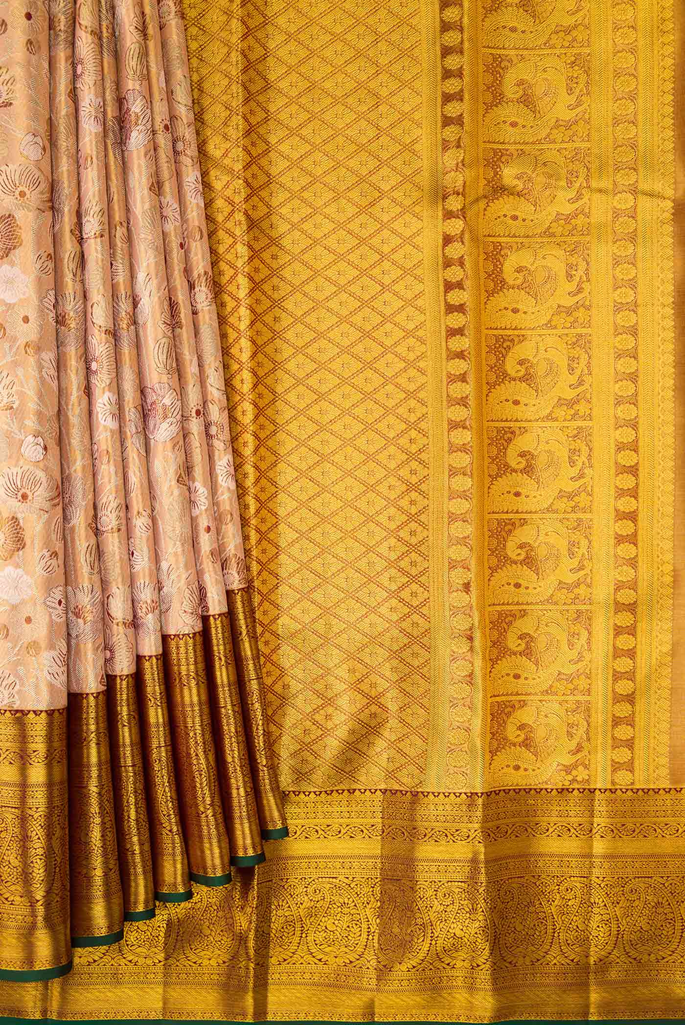 Pleats and pallu of Peach Dual Tone Kanchipuram Tissue Silk Saree with Zari Brocade on the body and Zari Border. 