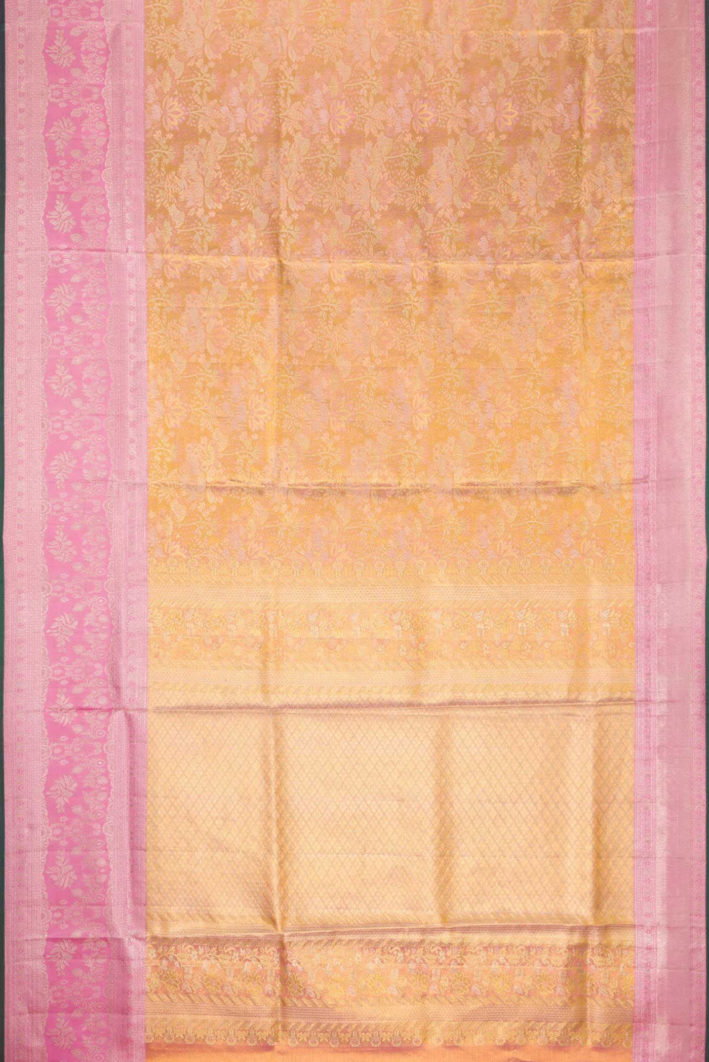 Flat view of Gold Dual Tone Kanjivaram Tissue Silk Saree with Zari Brocade on the body and Zari Border. 