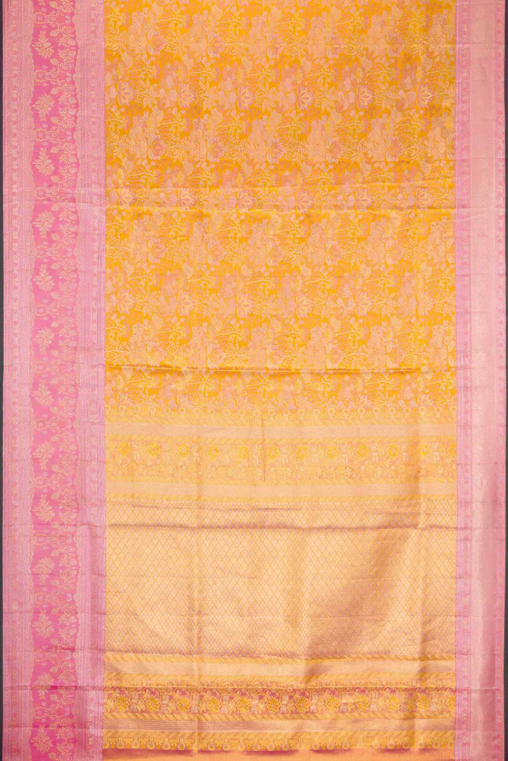 Flat view of Gold Dual Tone Kanjivaram Tissue Silk Saree with Zari Brocade on the body and Zari Border. 