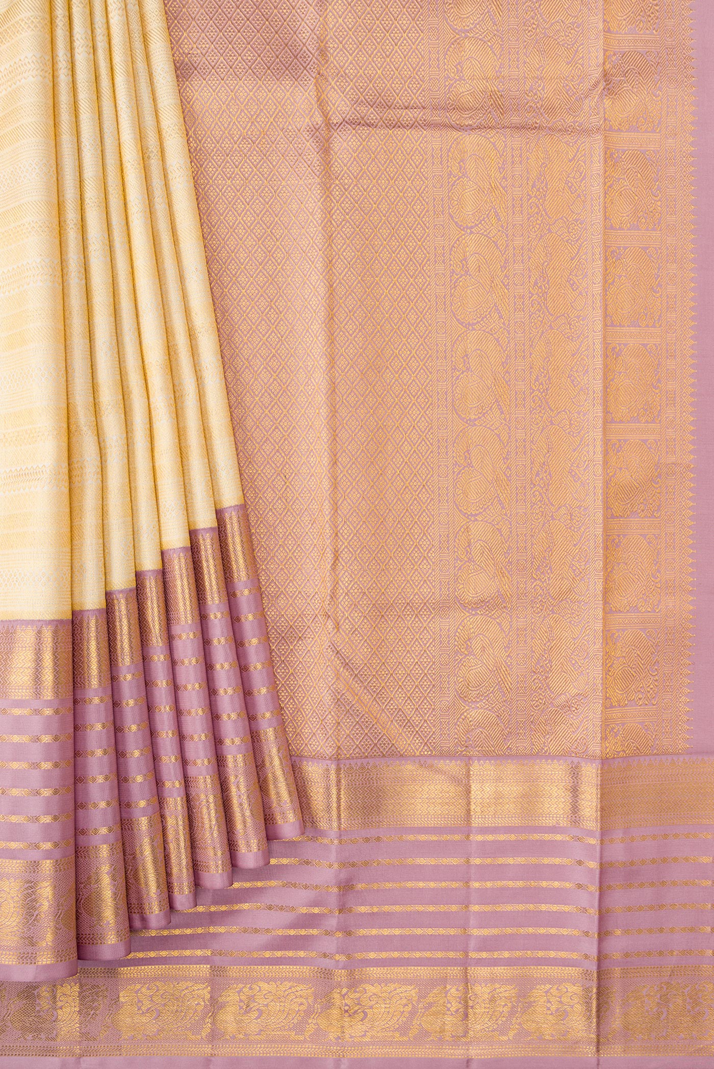 Pleats and pallu of Off White Dual Tone Kanjivaram Silk Saree with Zari Brocade on the body and Zari Border. 