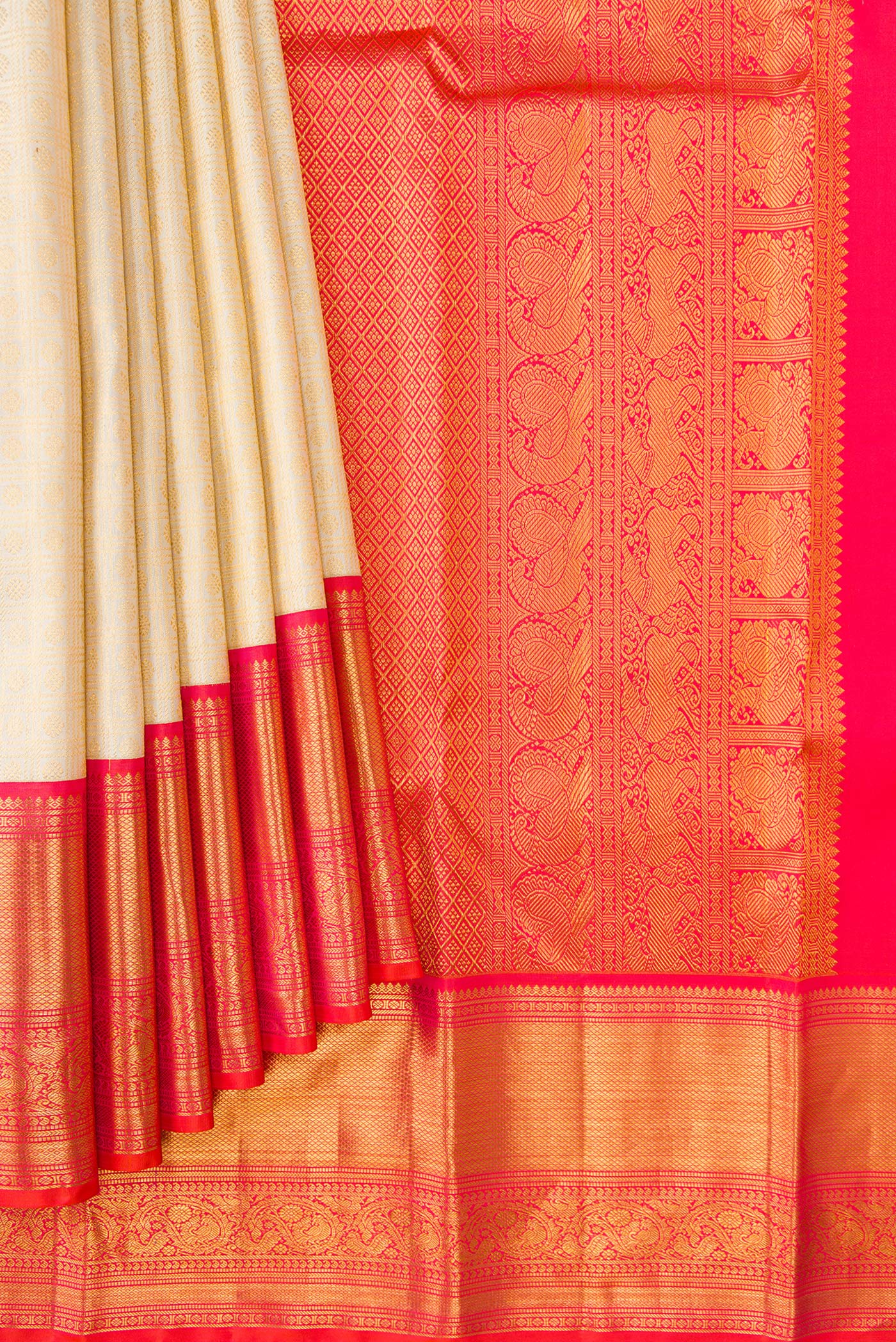 Pleats and pallu of Off White Dual Tone Kanjivaram Silk Saree with Zari Brocade on the body and Zari Border. 