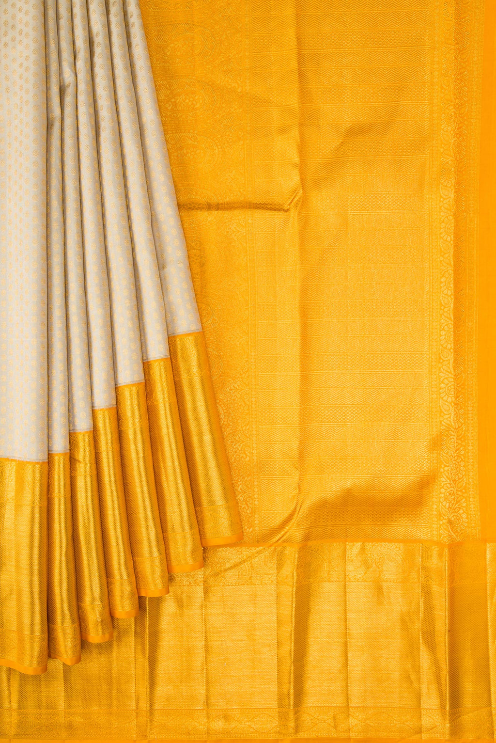 Pleats and pallu of Beige Dual Tone Kanjivaram Silk Saree with Zari Brocade on the body and Zari Border. 